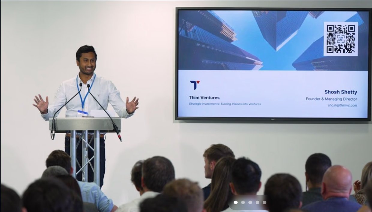 Shosh Shetty speaking at an event
